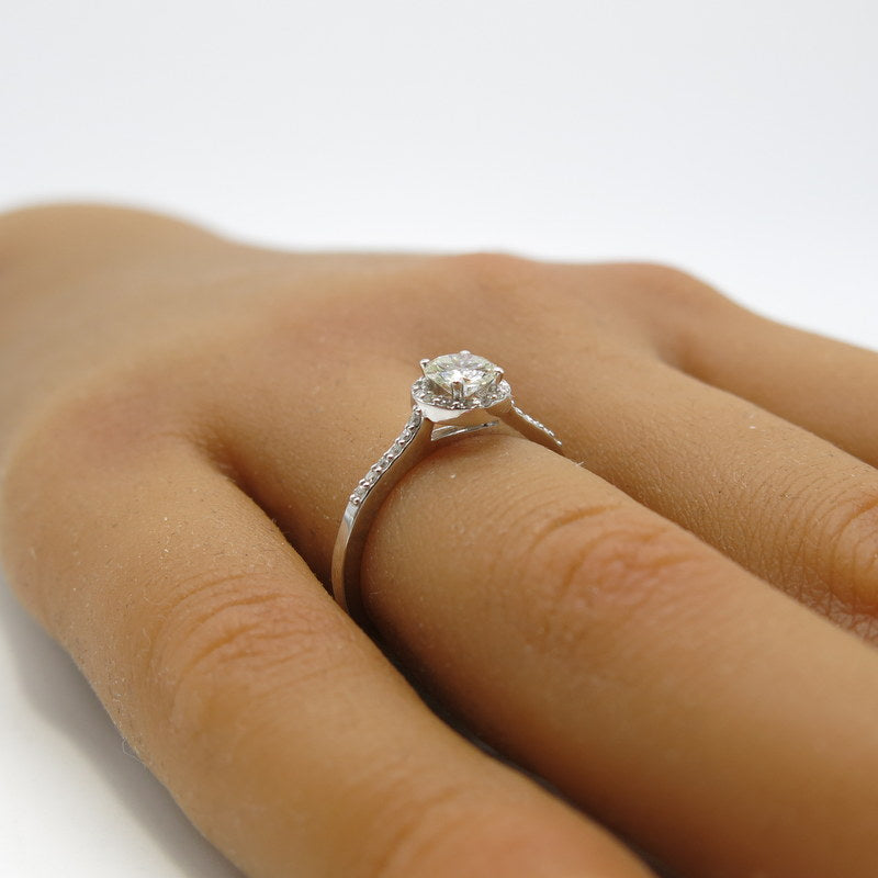 585/-er Weißgold Solitärring mit Brillanten ca.0.65ct. TW SI1 - Gr.54