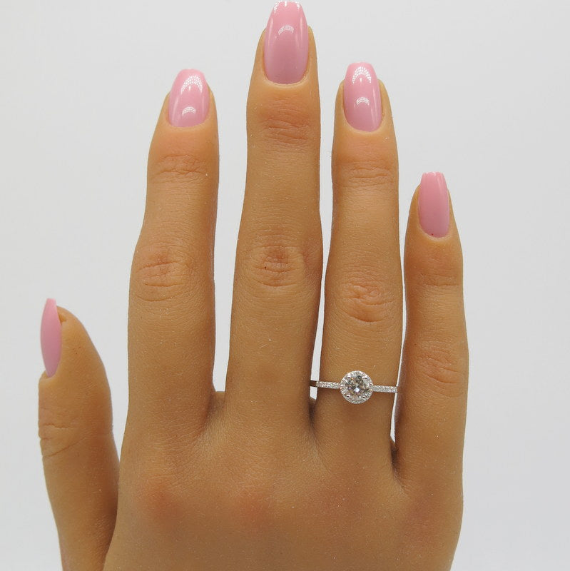 585/-er Weißgold Solitärring mit Brillanten ca.0.65ct. TW SI1 - Gr.54